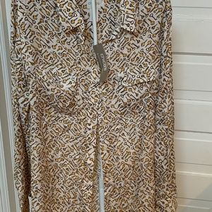 Chico’s NWT‎ viscose blouse. Keys all over it! Retail 89